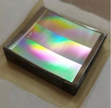 Concave Holographic Diffraction Gratings
